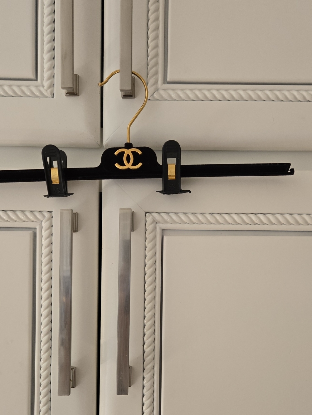 CHANEL Black and Gold Velvet Clip Hanger with CC Emblem